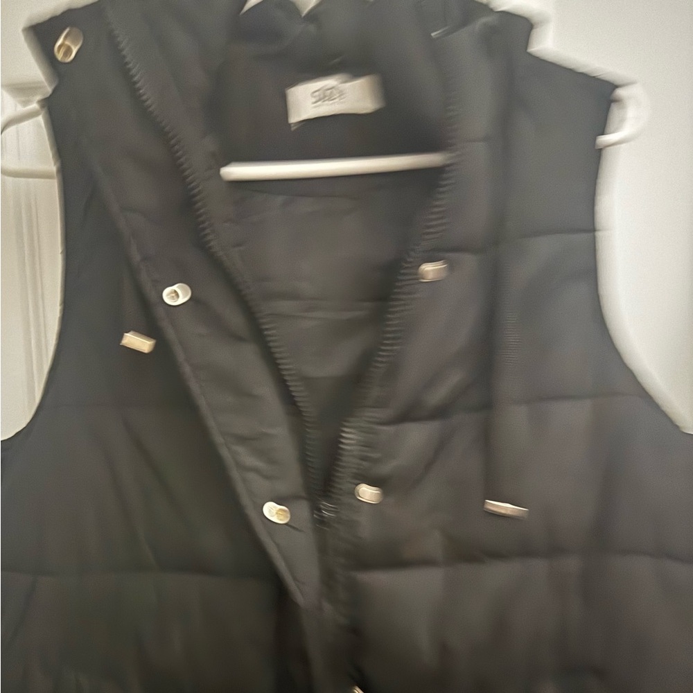 Women”s mid-length Black Puffer Vest